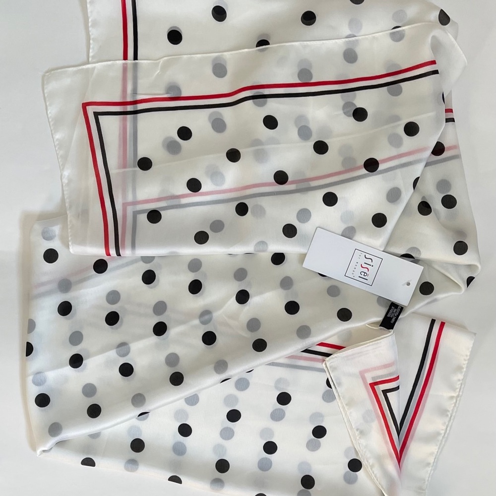 Black dots on white shawl